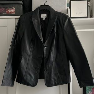 Vintage leather women’s blazer in a size large.
